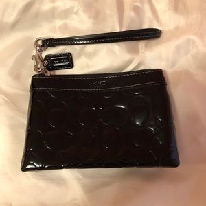 Black patent leather Coach wristlet